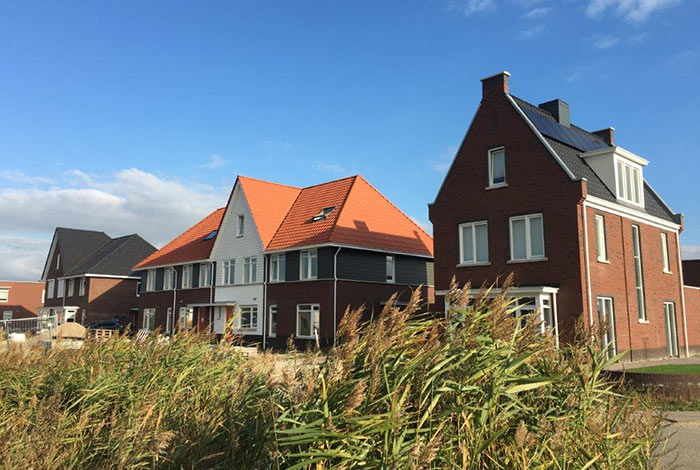 Nieuwbouw woningen, rijwoningen, twee-onder-één-kap woningen, Schouwen, Opleveringen